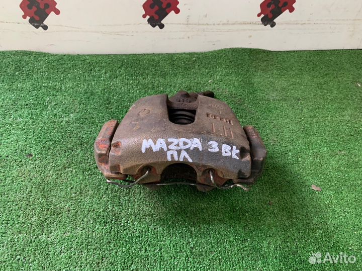 Суппорт тормозной передний Mazda 3 BK 2003-2009