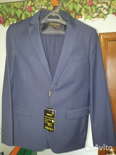 Новая. Школьная форма для мальчика Синий цв р. 146