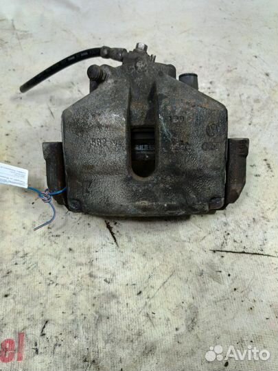 Суппорт тормозной передний правый Volkswagen Golf