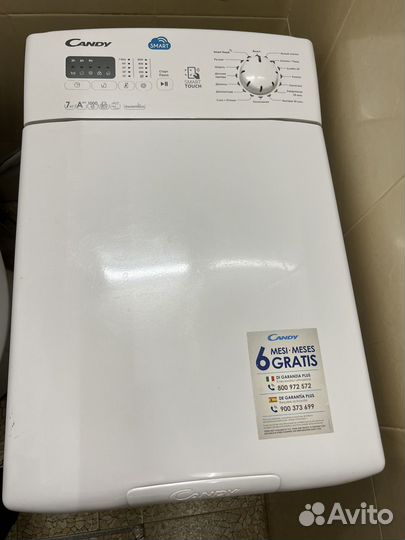 Стиральная машина с вертикальной загрузкой Candy