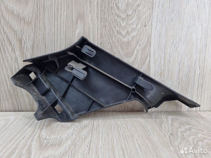 Обшивка стойки задняя левая Toyota Corolla E150