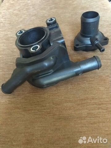 Корпус термостата на Форд фокус 1