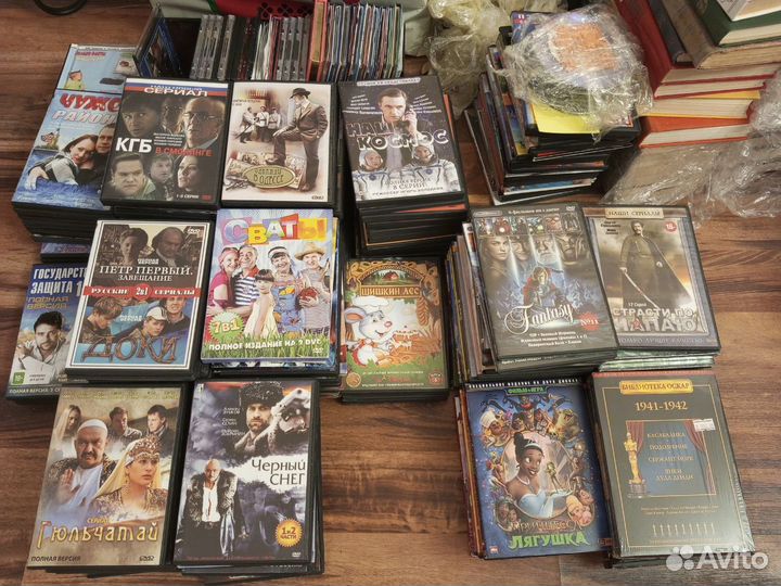 DVD диски с фильмами и мультфильмами пакетом