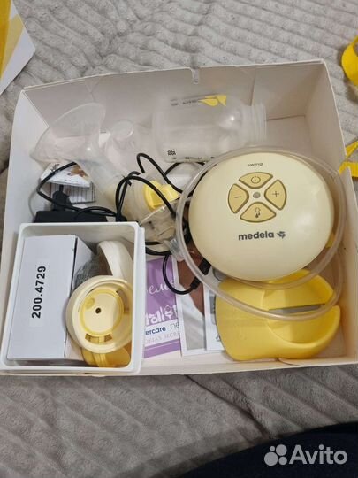 Молокоотсос medela электрический