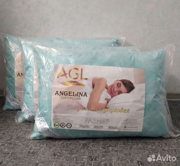 Новая Подушки пух-перо разные, размер 50*70см