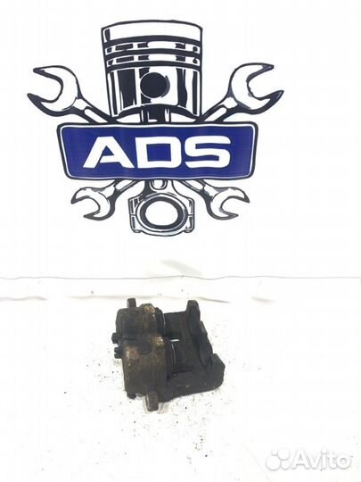 Суппорт тормозной передний левый Ssangyong Kyron 1