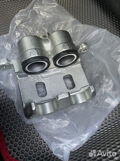 Суппорта тормозные передние субару