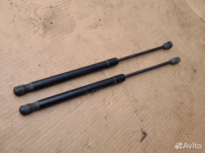 Амортизатор крышки багажника Opel Astra H