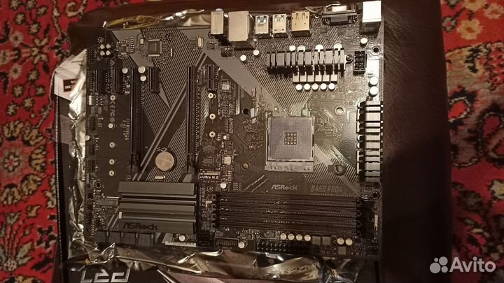 Материнская плата ASRock Soc-AM4 AMD B450 4xDDR4