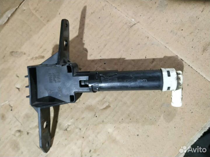 Форсунка омывателя фары Mazda CX-7