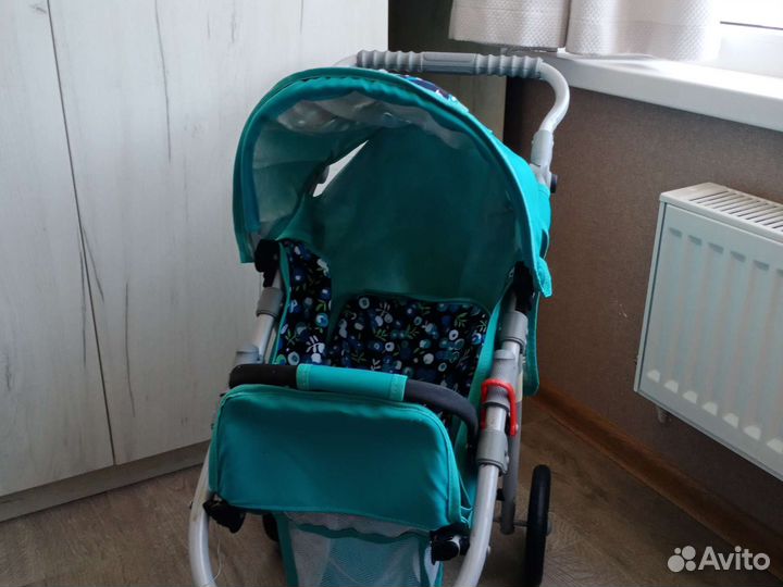 Игрушечная коляска для кукол