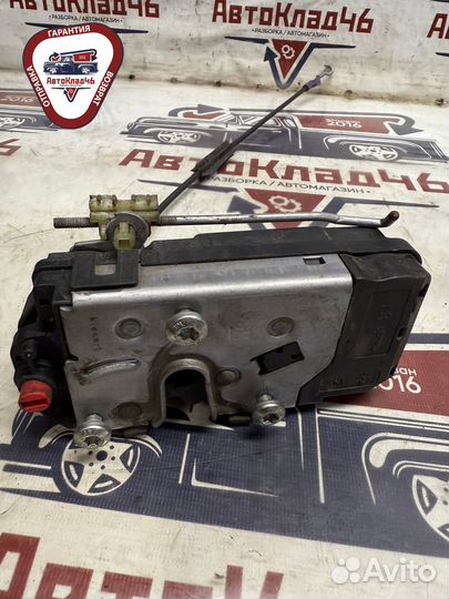 Замок двери задней левой Opel Astra H