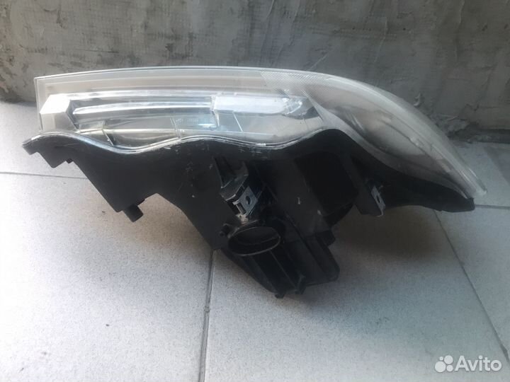 Фара левая галоген рест Nissan Navara D40