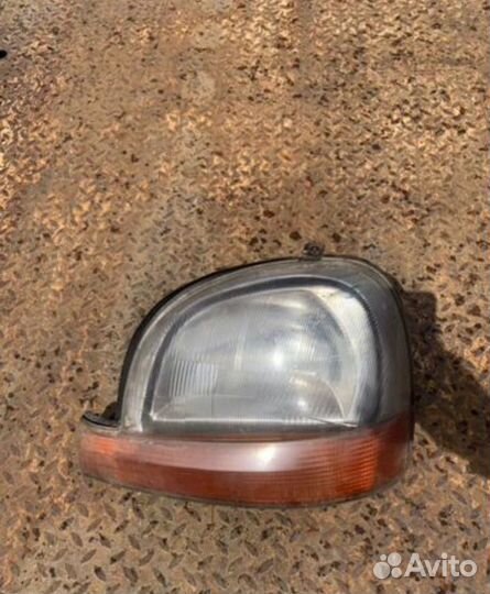 Фара галогеновая передняя левая Renault Kangoo