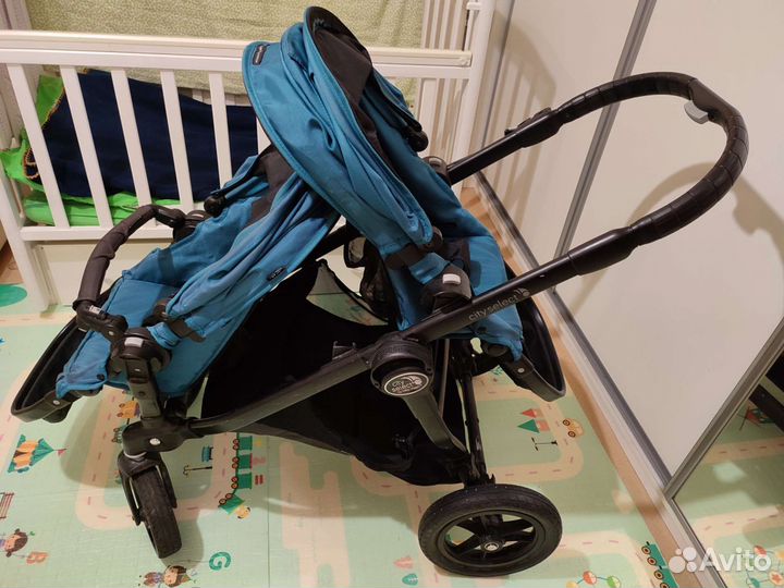 Коляска для двойни / погодок Baby Jogger