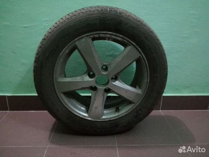 Литой диск с шиной