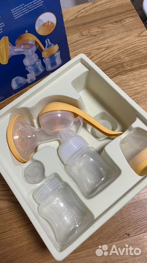 Молокоотсос ручной новый и подогреватель бутылочки