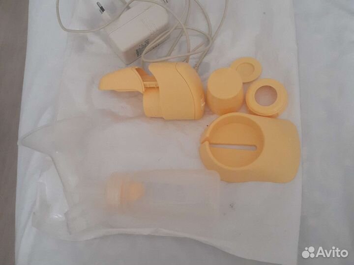 Молокоотсос электрический