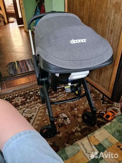 Коляска автокресло doona с базой isofix