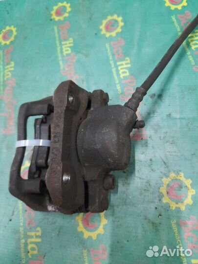 Суппорт передний левый Renault Sandero хечбэк 1.4