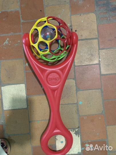 Игрушка каталка с ручкой