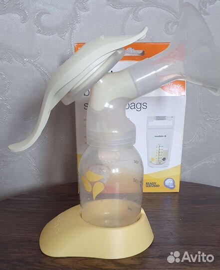 Молокоотсос medela ручной