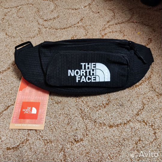 Поясная сумка the north face