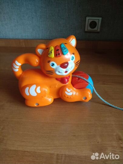 Игрушка-каталка музыкальная
