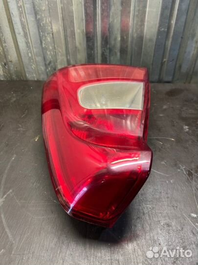 Фонарь заднего хода задний правый Renault Logan