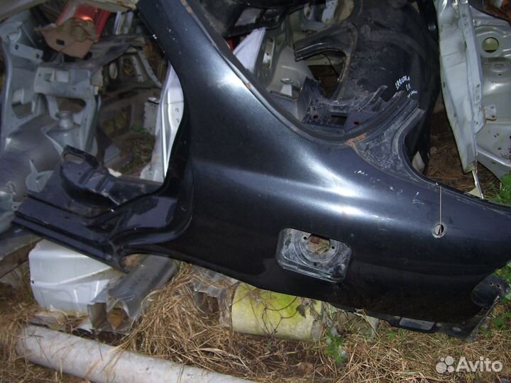 Киа спектра крыло заднее