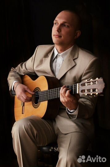 Преподаватель игры на гитаре