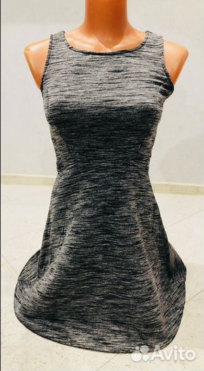 Два огромных пакета одежды 44