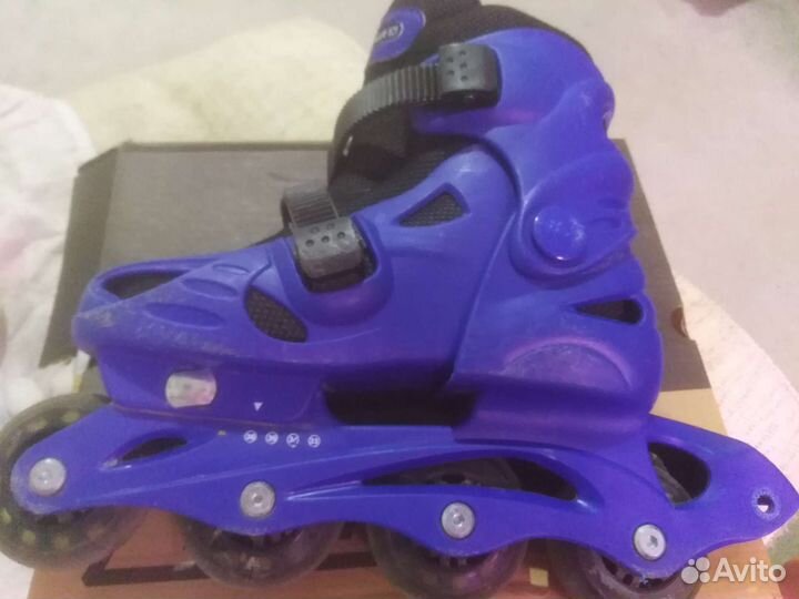 Роликовые коньки