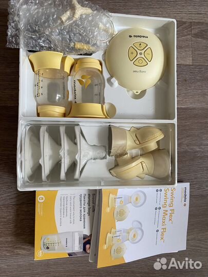 Молокоосос medela swing maxi flex