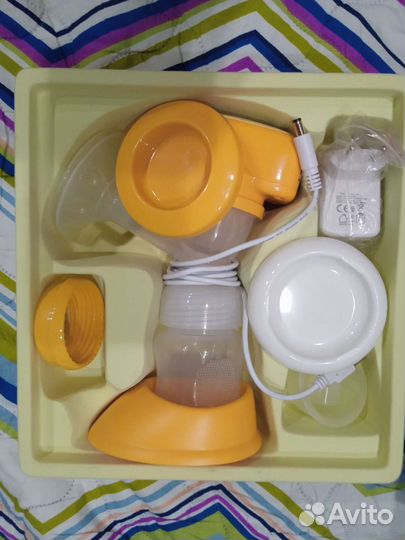 Молокоотсос электрический