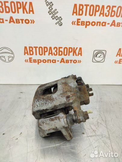 Суппорт тормозной передний левый Chevrolet Aveo