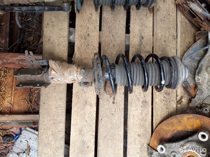 Стойка амортизатор Opel Astra H Zafira B