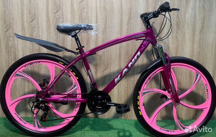 Велосипед розовый а литых дисках