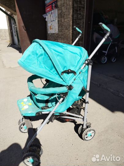 Прогулочная коляска трость