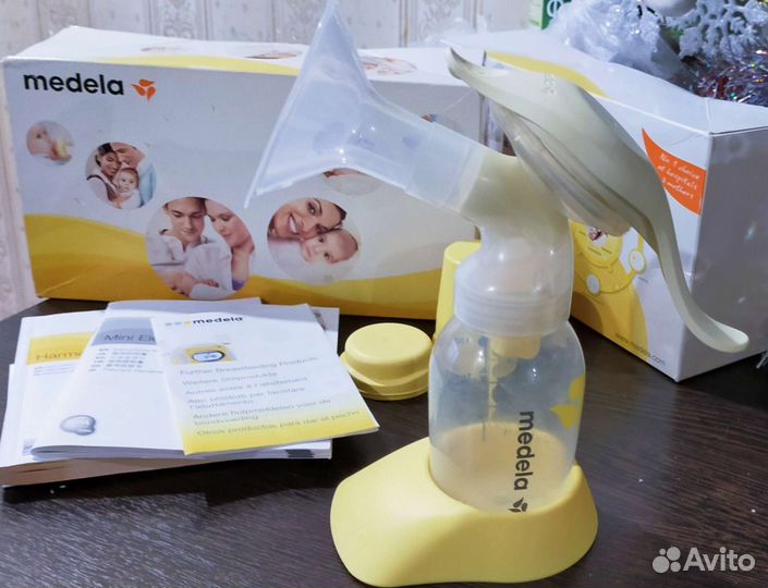Молокоотсос medela