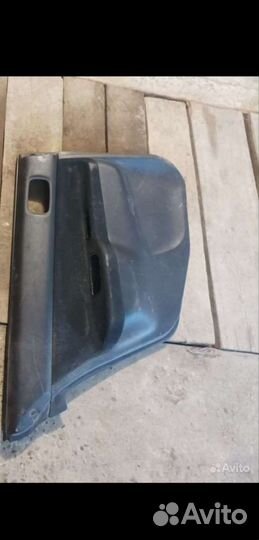 Обшивка двери салон лансер 9