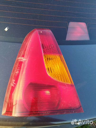 Задний левый фонарь Renault Logan