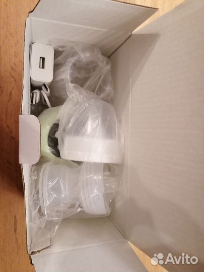 Молокоотсос электрический новый