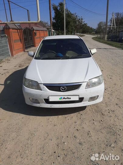 Mazda Familia 1.5 AT, 2000, 399 400 км