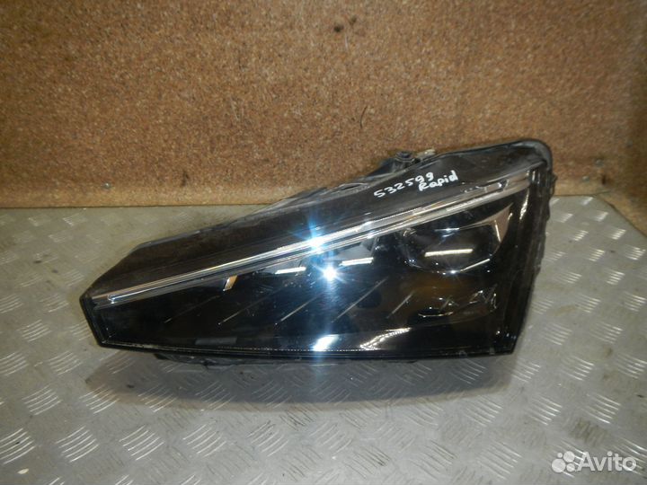 Фара левая Skoda Rapid