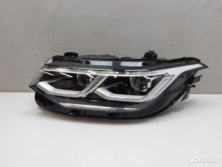 Фара левая Volkswagen Tiguan