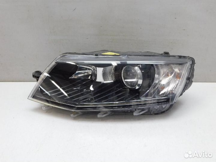 Фара левая Skoda Octavia
