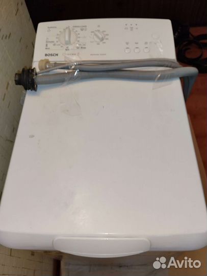 Стиральная машина Bosch с вертикальной загрузкой