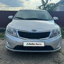 Kia Rio 1.6 AT, 2014, 208 500 км, с пробегом, цена 910 000 руб.