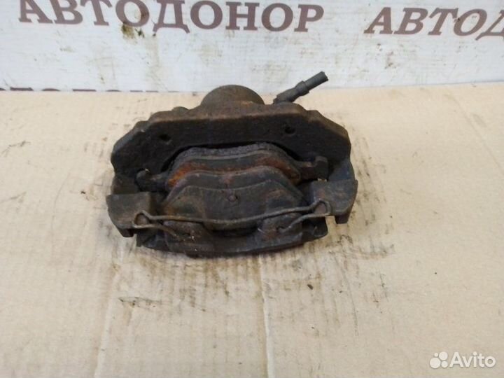 Суппорт тормозной передний правый Ford Fiesta 1.4D